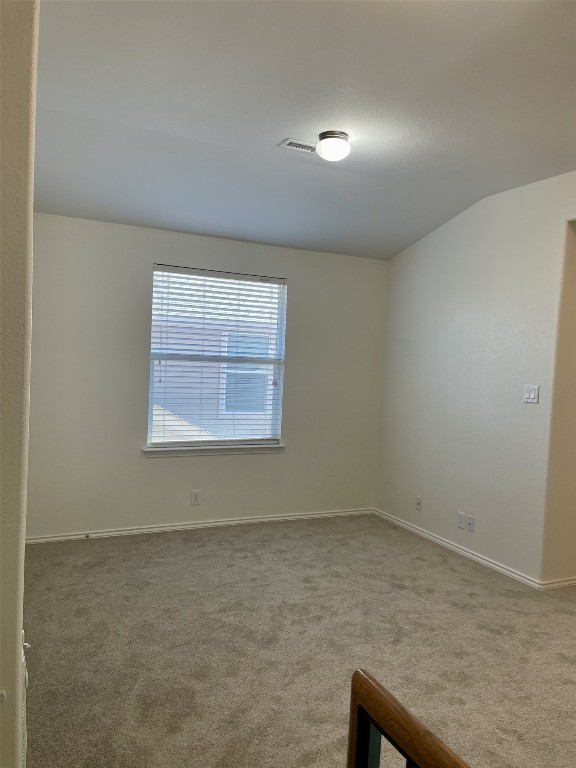 8725 White Ibis Drive Austin, TX 78729 - Photo 14 of 29 an empty room with a window