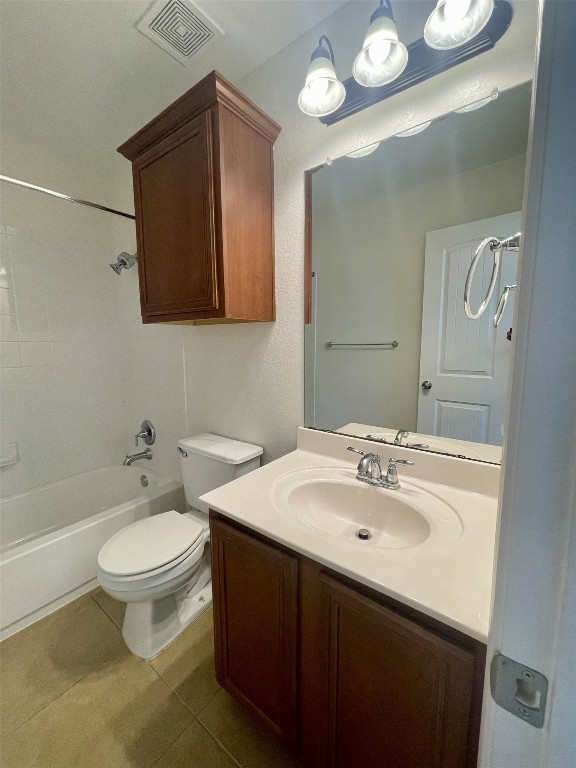 8725 White Ibis Drive Austin, TX 78729 - Photo 26 of 29 a bathroom with a sink and a mirror