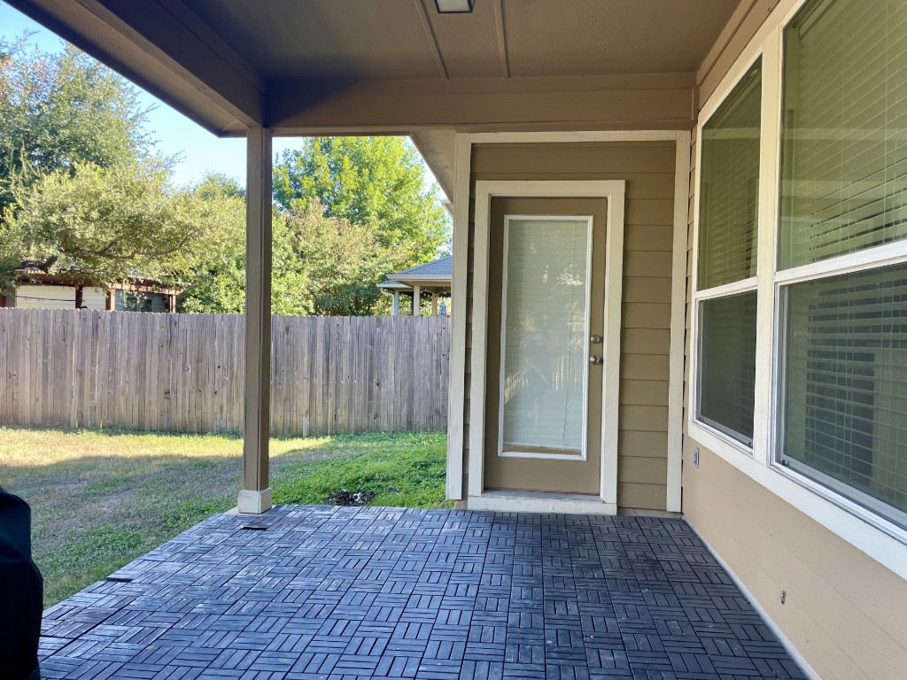 8725 White Ibis Drive Austin, TX 78729 - Photo 29 of 29 a view of backyard with green space