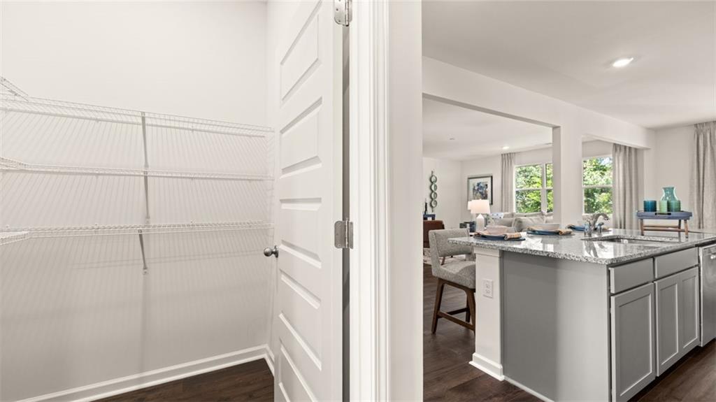 56 Weymouth Drive Locust Grove, GA 30248 - Photo 18 of 62 a view of a kitchen from the hallway