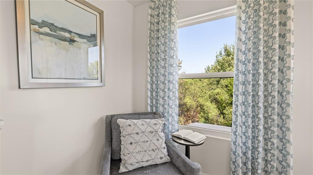 56 Weymouth Drive Locust Grove, GA 30248 - Photo 39 of 62 a bathroom with a toilet sink and mirror