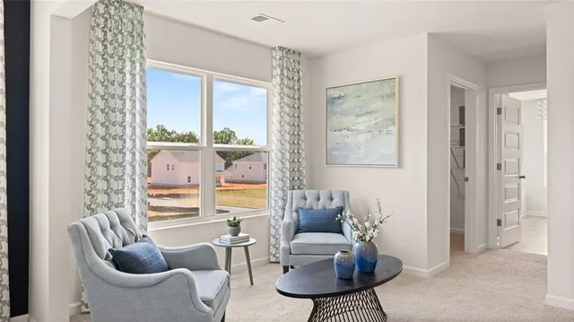 a living room with furniture and a couch