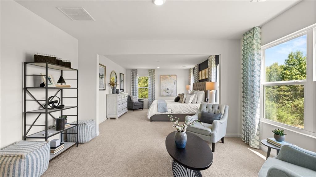 56 Weymouth Drive Locust Grove, GA 30248 - Photo 41 of 62 a living room with furniture and a window