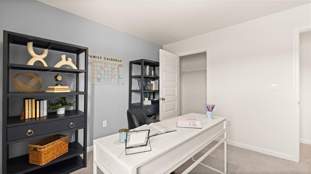 56 Weymouth Drive Locust Grove, GA 30248 - Photo 60 of 62 a dining room with furniture and wooden floor