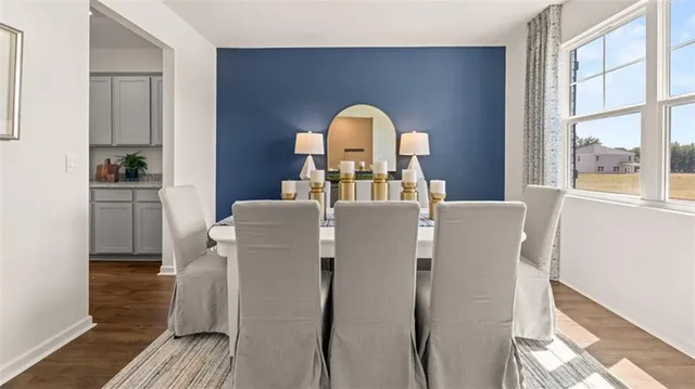 a kitchen with stainless steel appliances granite countertop a stove and a refrigerator