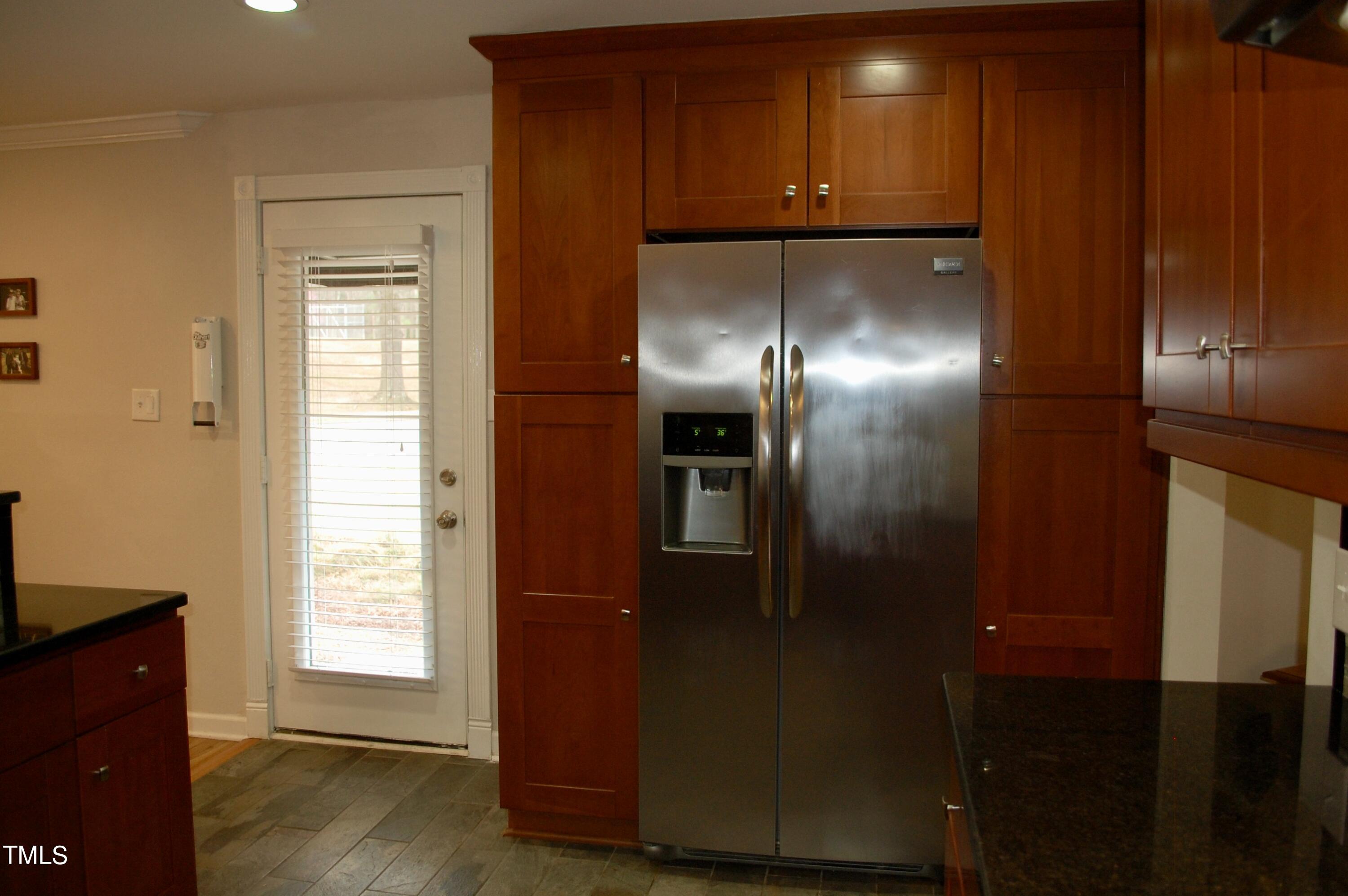 933 Brookside Drive Raleigh, NC 27604 - Photo 7 of 38 a view of empty room with wooden floor