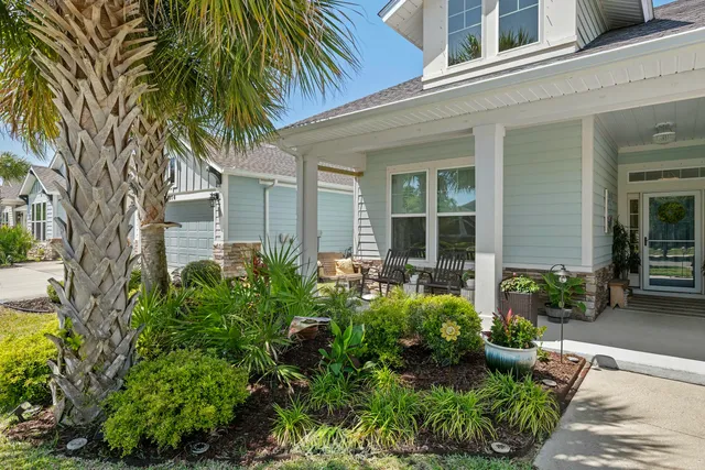 a living room with fireplace furniture and a flat screen tv