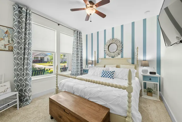 a bed room with a bed and a chandelier