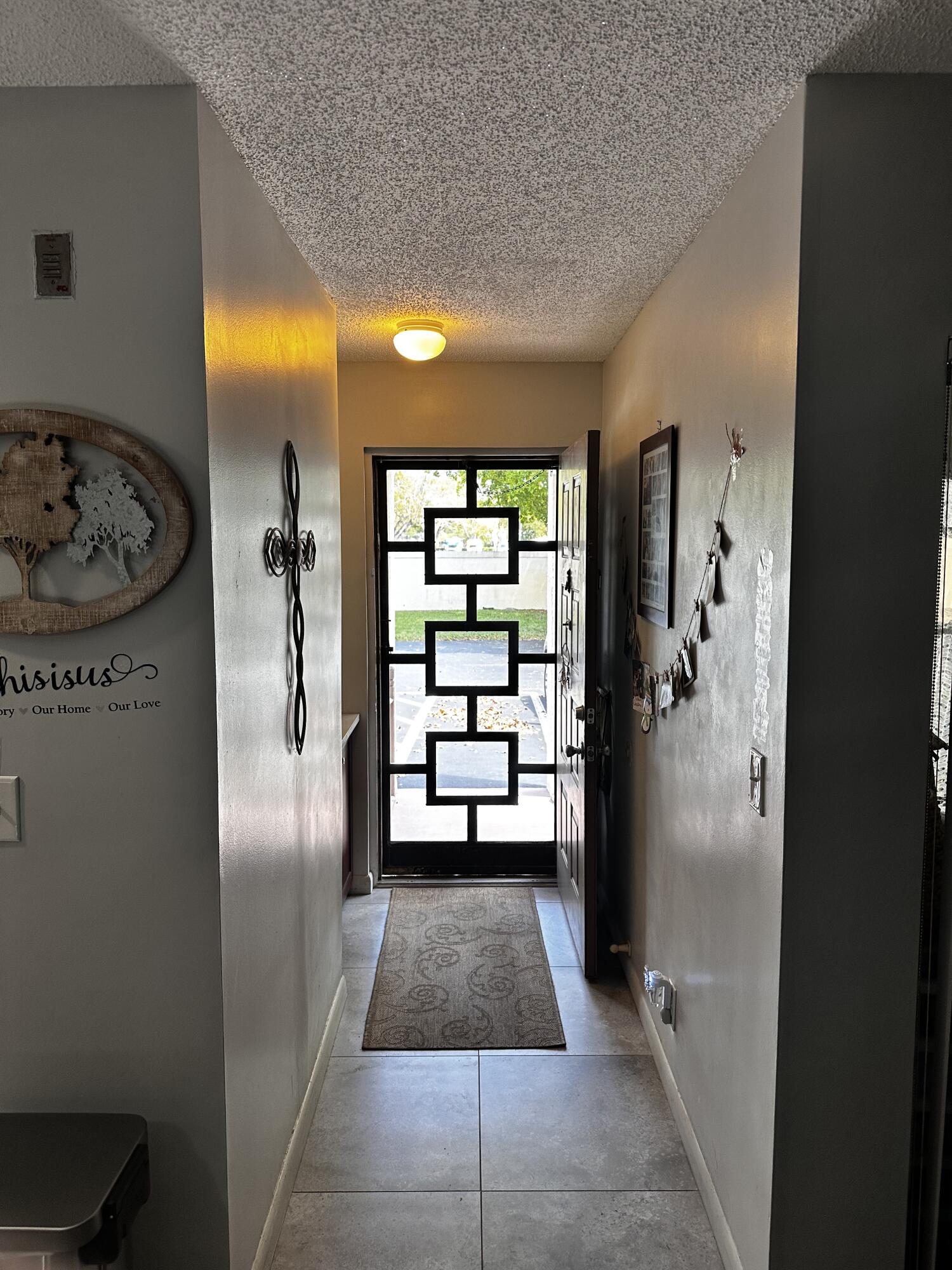 14895 Builtmore Way, Unit 107 Delray Beach, FL 33446 - Photo 14 of 29 entrance hall