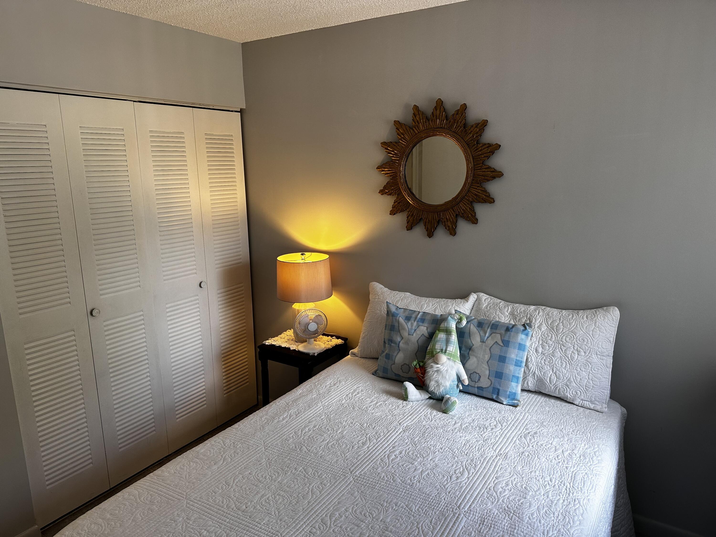 14895 Builtmore Way, Unit 107 Delray Beach, FL 33446 - Photo 17 of 29 2nd bedroom w closet