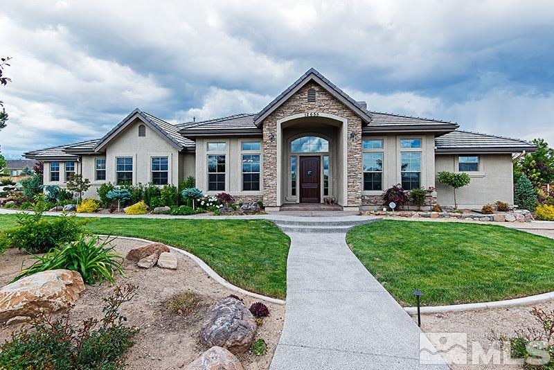12655 Silver Wolf Road Reno, NV 89511 - Photo 1 of 1 a front view of a house with a yard