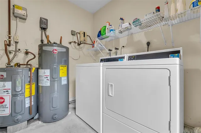 a utility room with dryer and washer