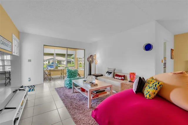 a bed room with two beds and a window