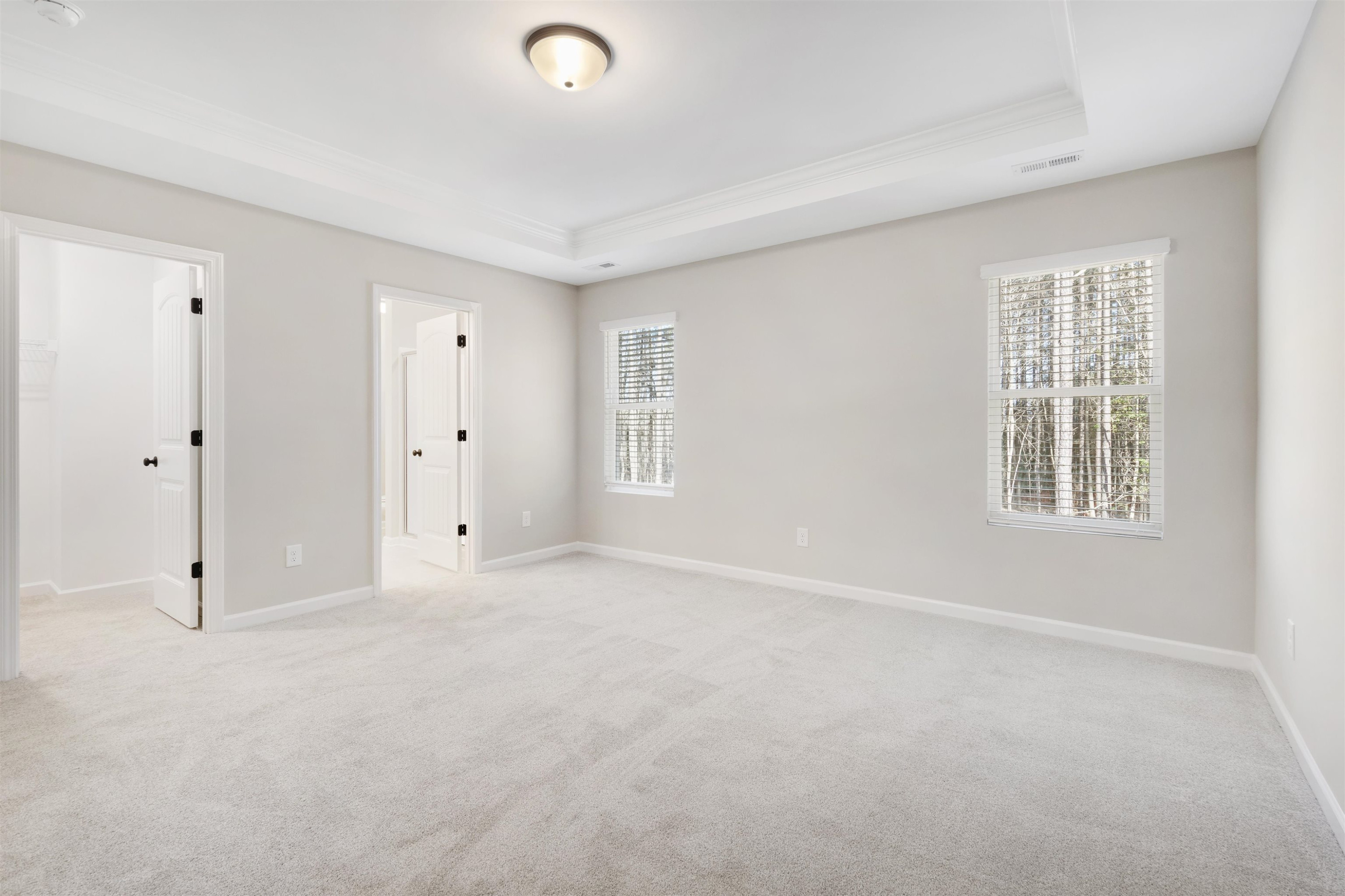 372 Nickleby Way Wendell, NC 27591 - Photo 19 of 37 an empty room with windows