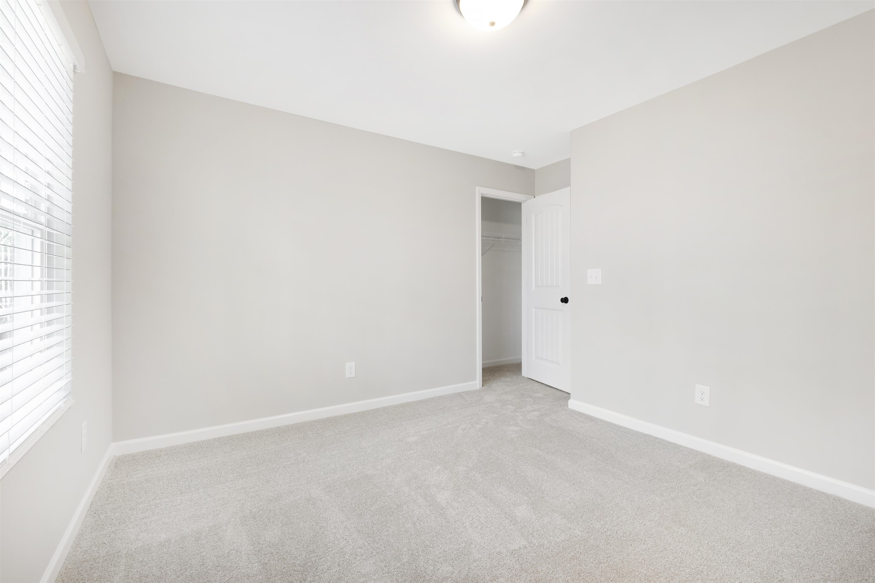 372 Nickleby Way Wendell, NC 27591 - Photo 24 of 37 an empty room with an entryway