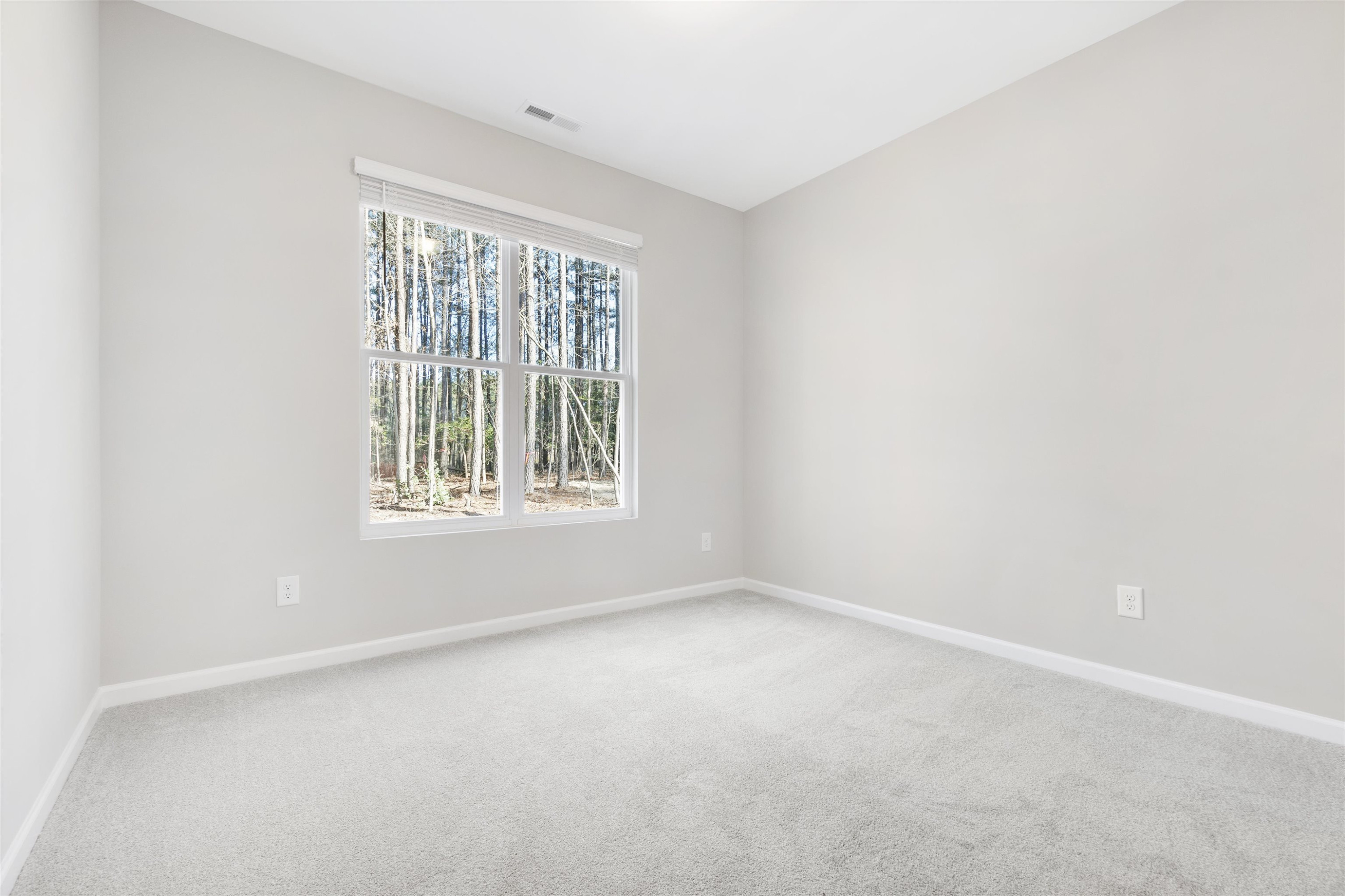 372 Nickleby Way Wendell, NC 27591 - Photo 25 of 37 an empty room with a window