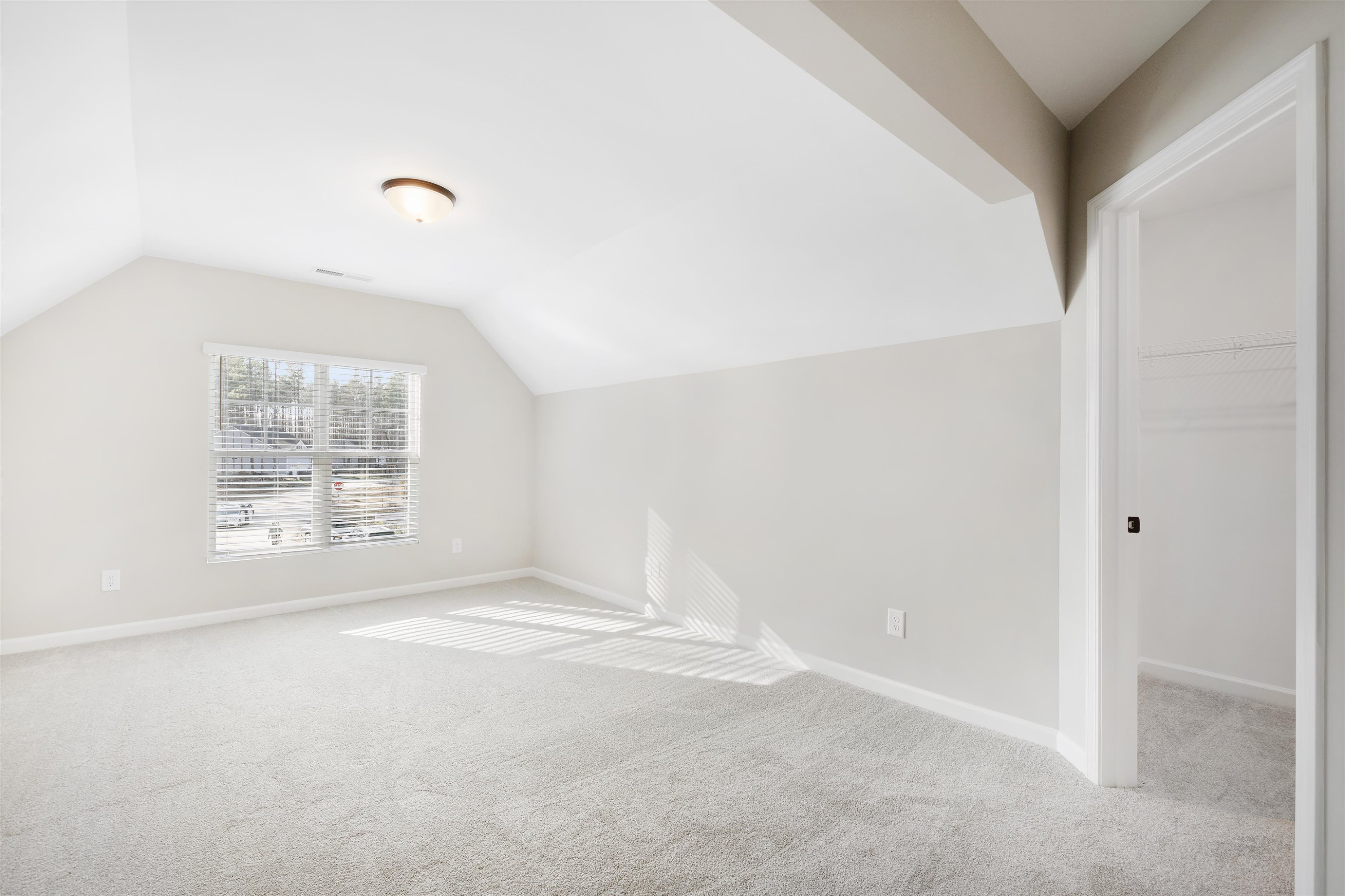 372 Nickleby Way Wendell, NC 27591 - Photo 27 of 37 a view of an empty room with a window