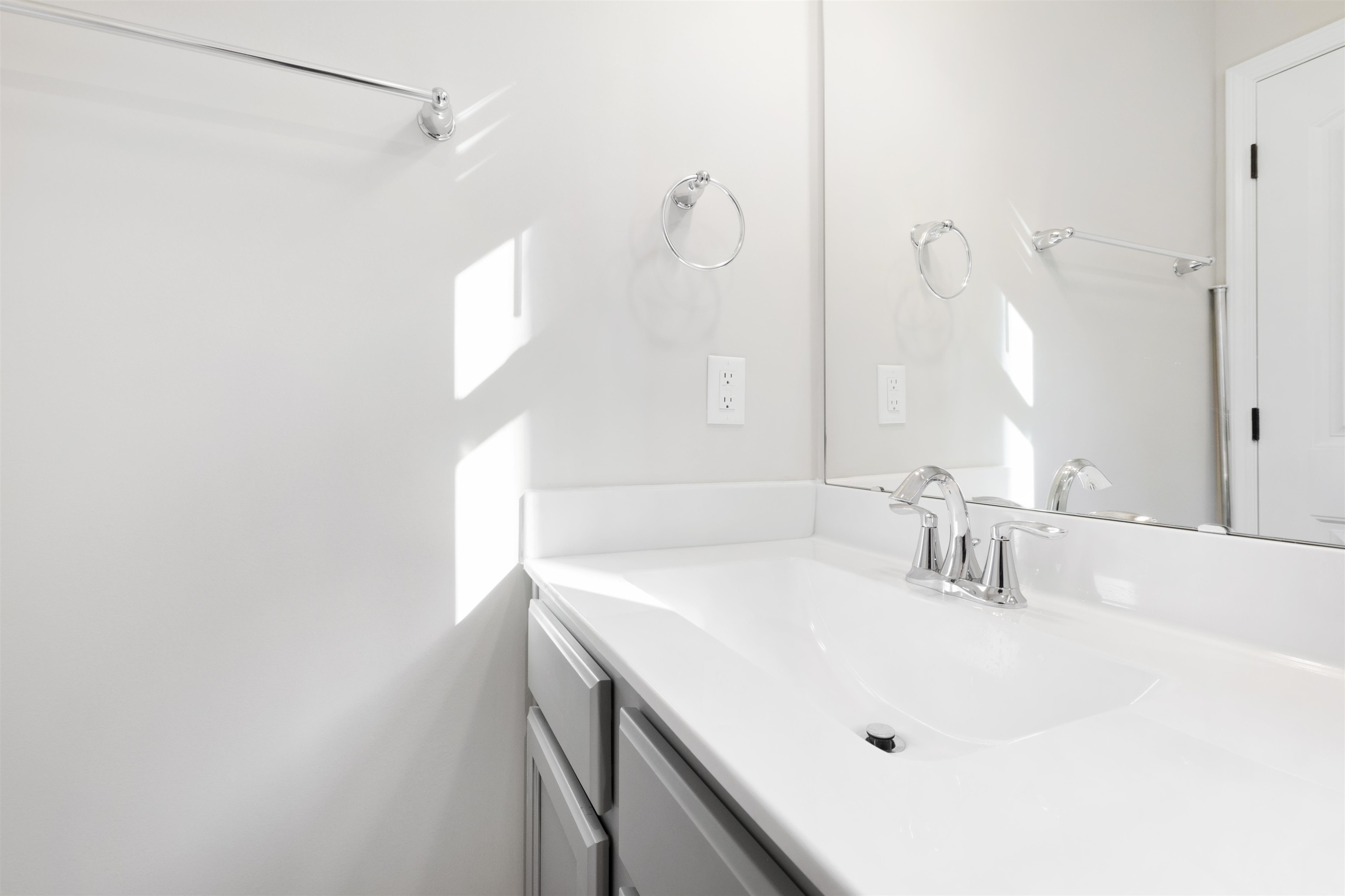372 Nickleby Way Wendell, NC 27591 - Photo 29 of 37 a bathroom with a sink and a mirror