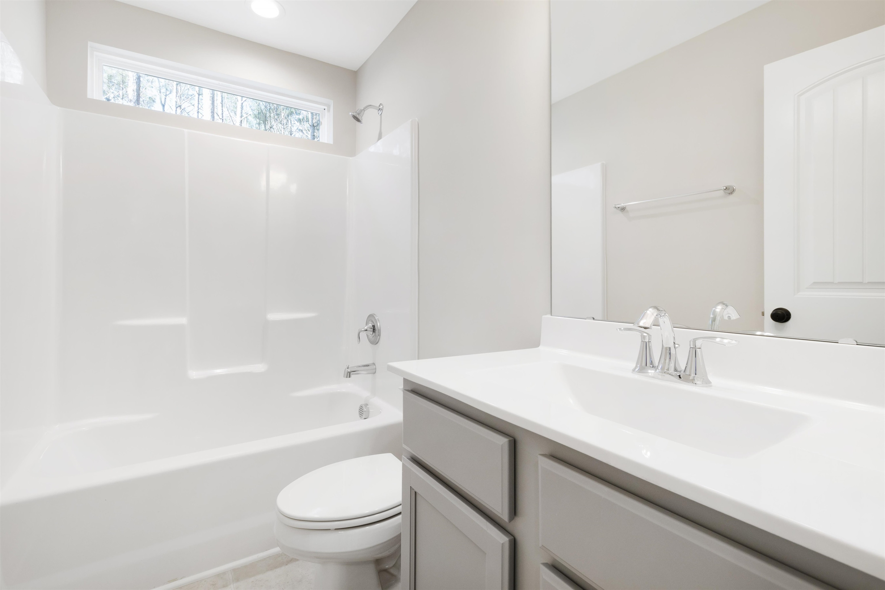 372 Nickleby Way Wendell, NC 27591 - Photo 30 of 37 a bathroom with a sink a toilet and a bathtub