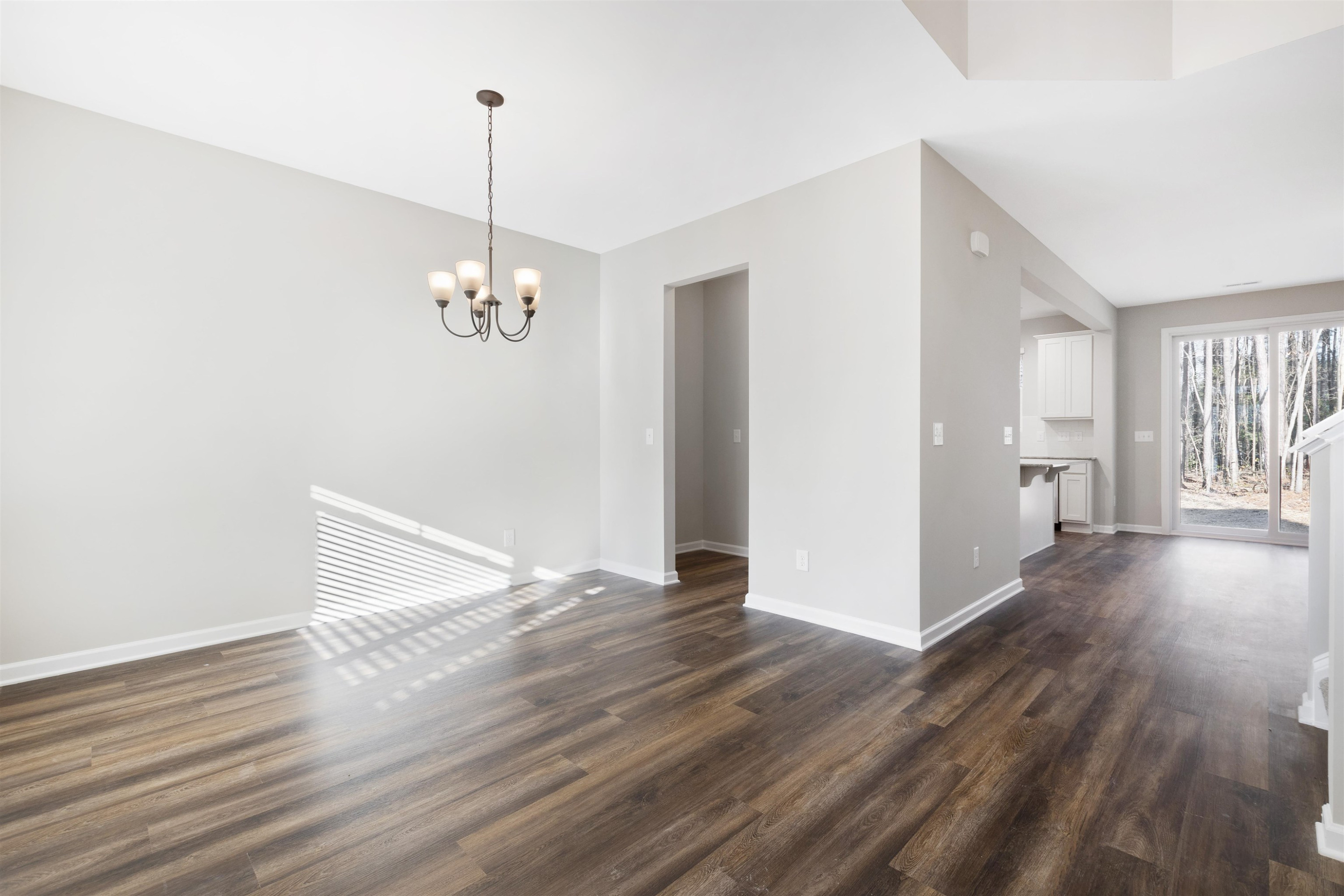 372 Nickleby Way Wendell, NC 27591 - Photo 3 of 37 a view of a room with wooden floor and window