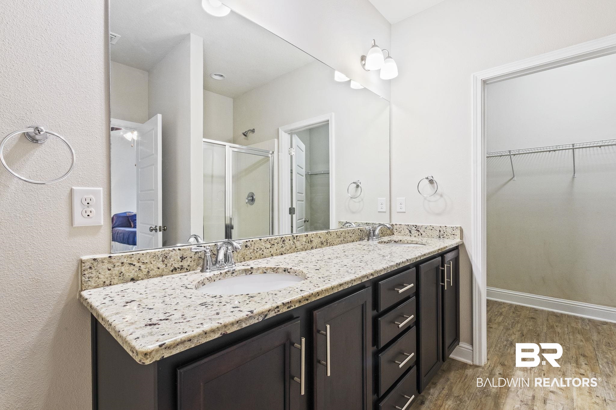 31643 Kestrel Loop Daphne, AL 36527 - Photo 23 of 59 Bathroom featuring hardwood / wood-style floors, walk in shower, and vanity