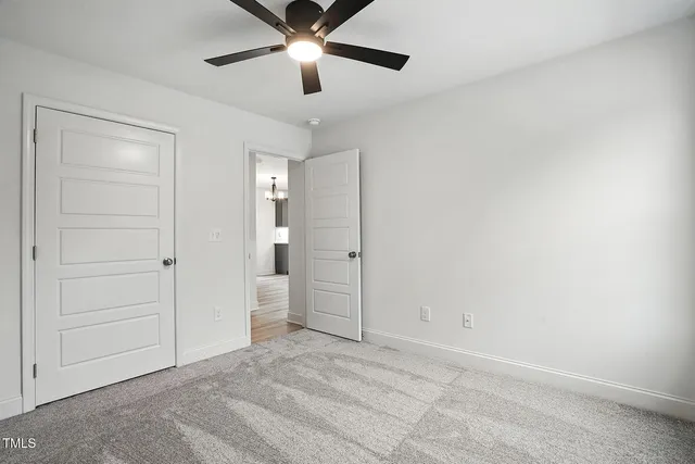 an empty space with closet area