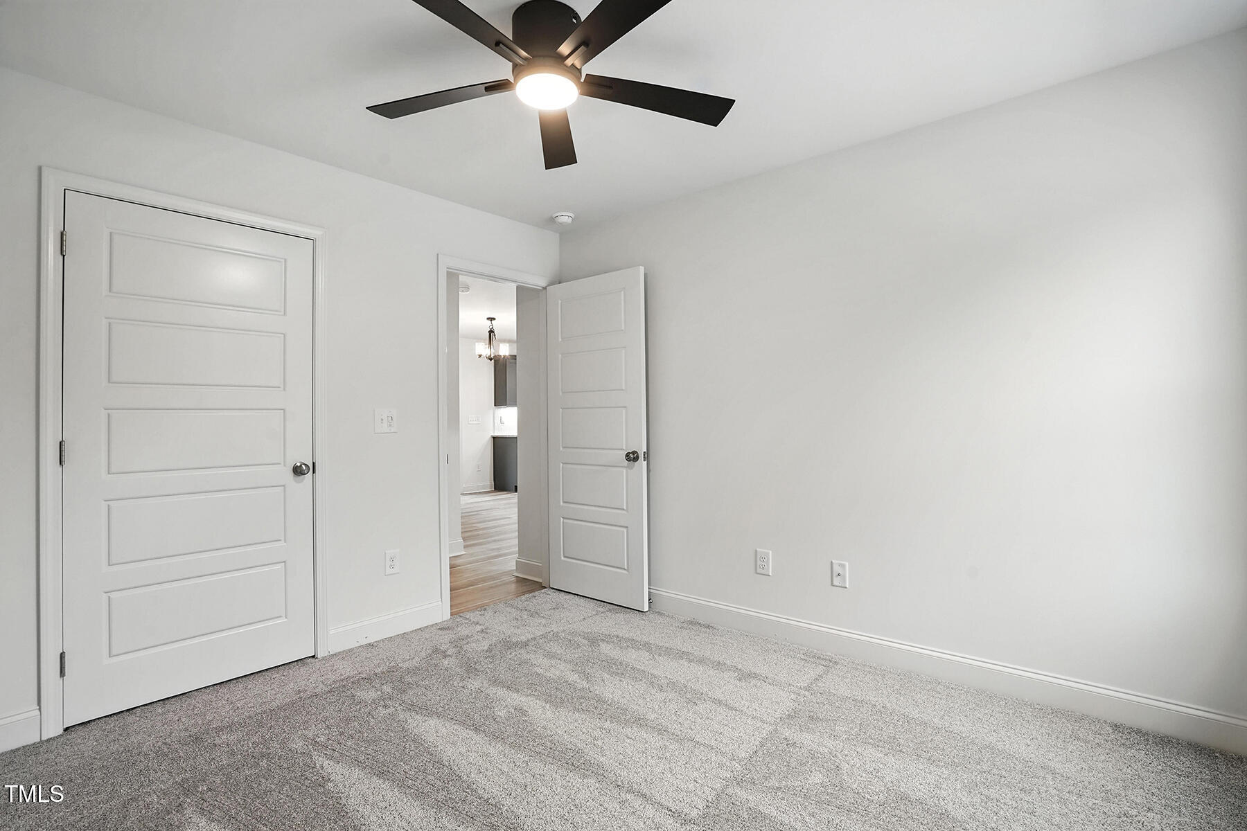 8670 Green Path Road Dunn, NC 28334 - Photo 16 of 34 an empty space with closet area