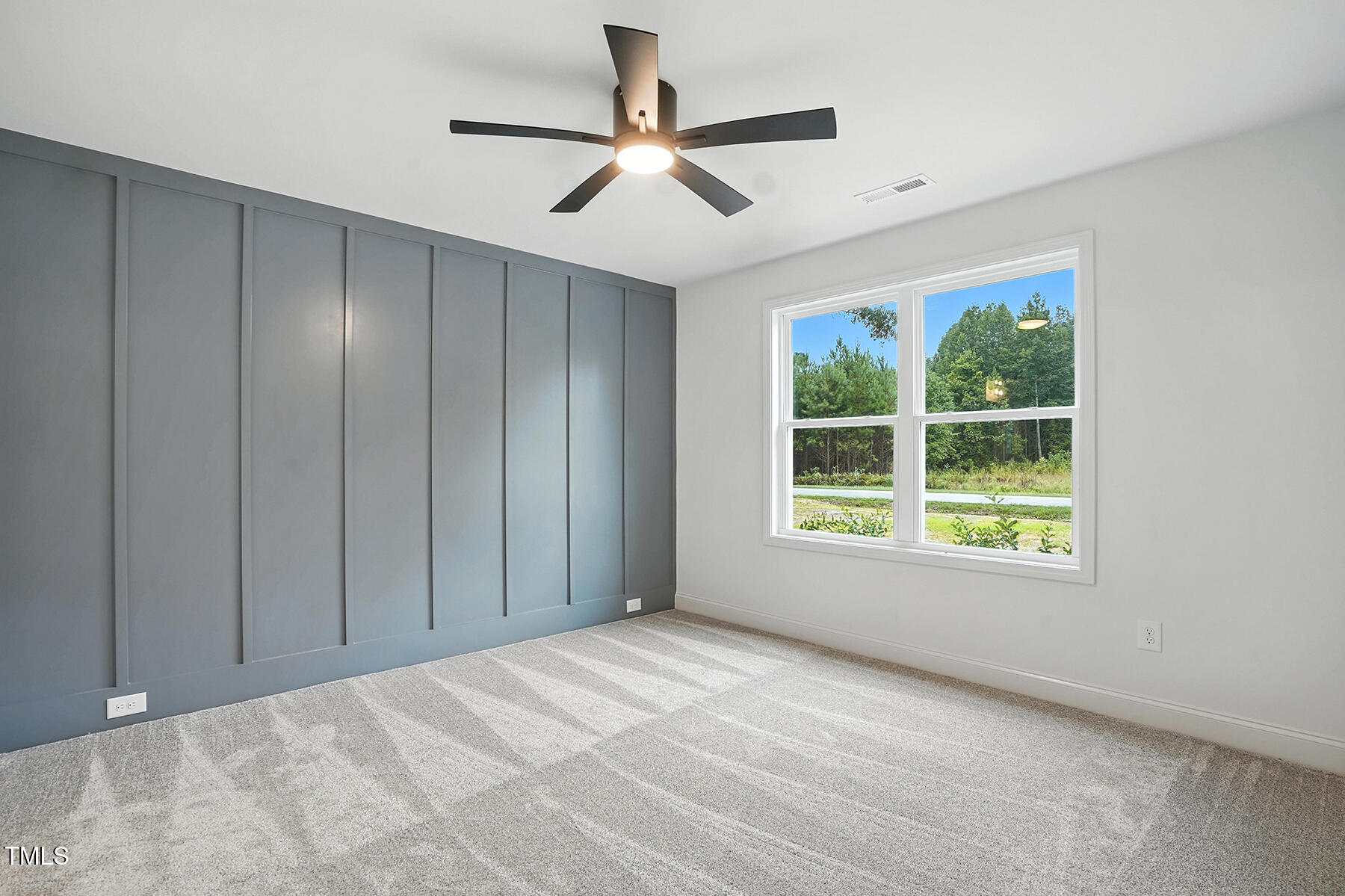 8670 Green Path Road Dunn, NC 28334 - Photo 22 of 34 a view of an empty room with a window