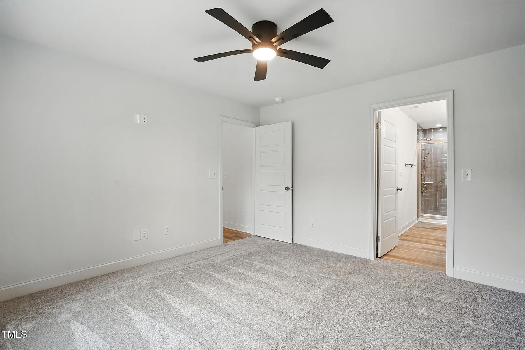 8670 Green Path Road Dunn, NC 28334 - Photo 23 of 34 a view of a big room with a ceiling fan