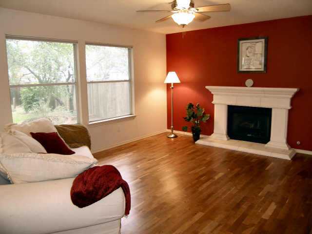 4628 Walsall Loop Austin, TX 78749 - Photo 1 of 1 a bedroom with a bed and a fireplace