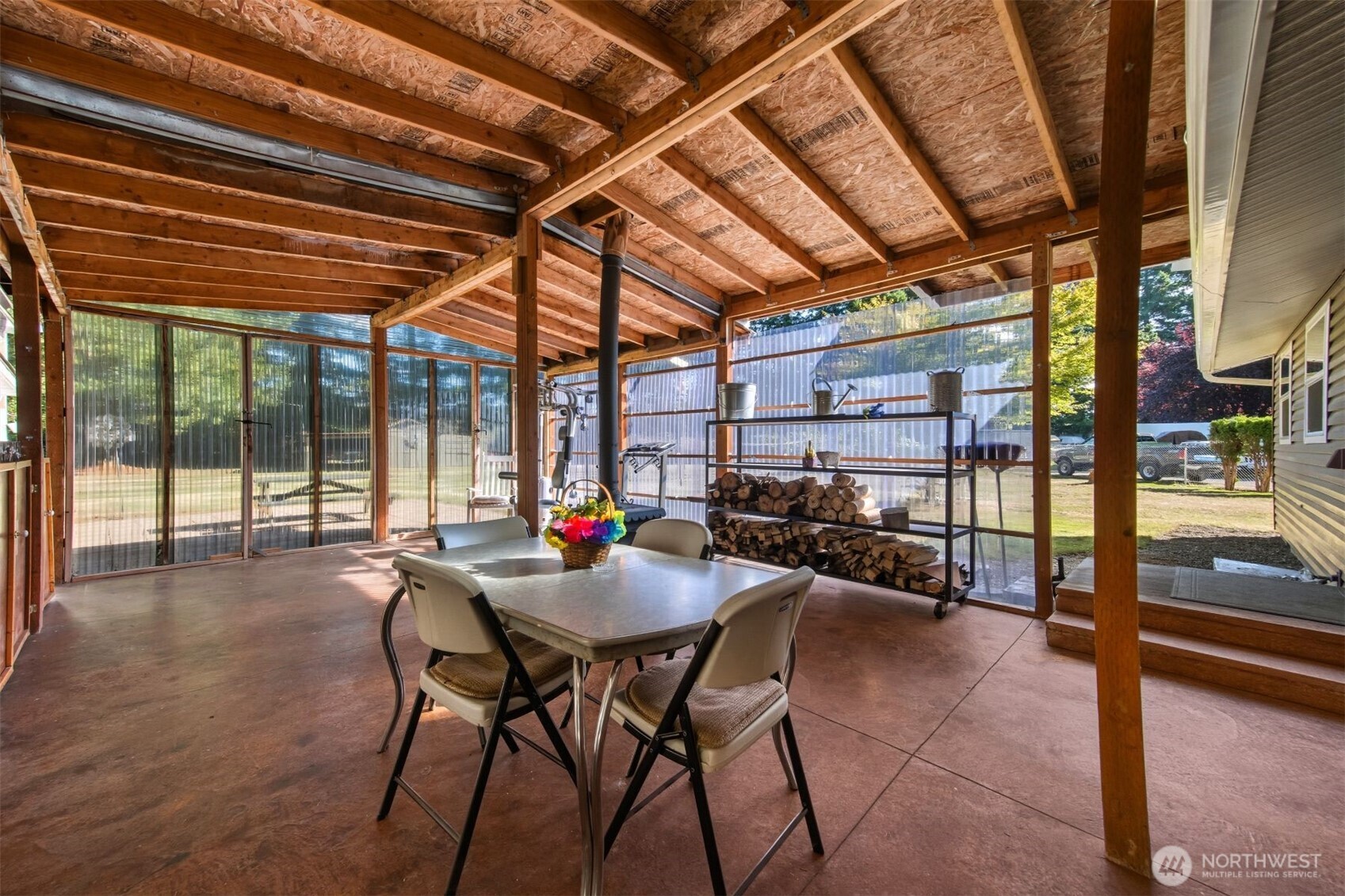 3648 Birch Terrace Court Custer, WA 98240 - Photo 20 of 28 a view of a dinning table and chairs in the patio