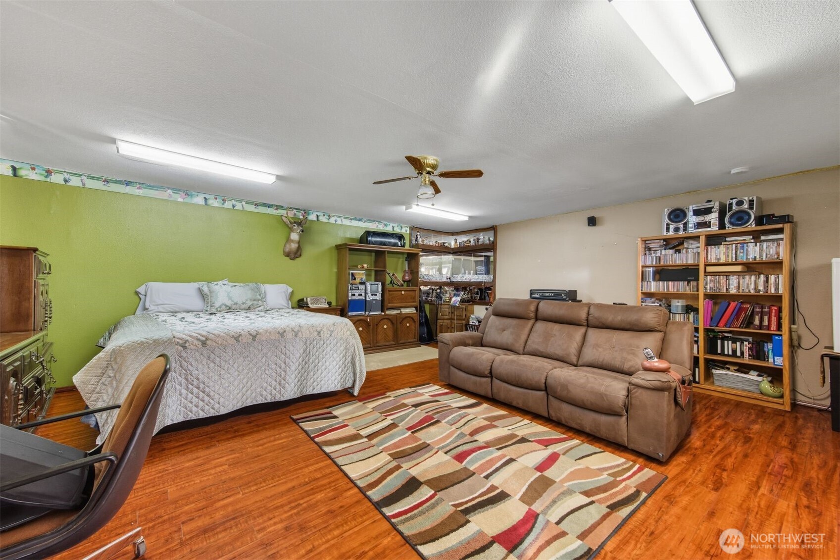 3648 Birch Terrace Court Custer, WA 98240 - Photo 22 of 28 a living room with furniture and a book shelf