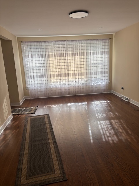 5131 Latrobe Avenue Chicago, IL 60638 - Photo 2 of 23 a view of an empty room with a window