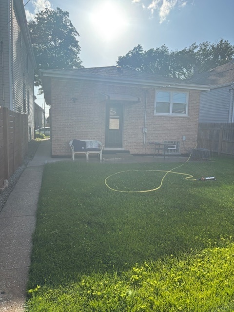 5131 Latrobe Avenue Chicago, IL 60638 - Photo 21 of 23 a view of a house with a backyard