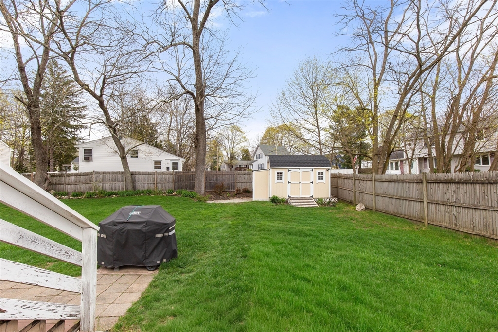 22 Baker Street Brockton, MA 02302 - Photo 27 of 32 a view of a house with backyard and a tree