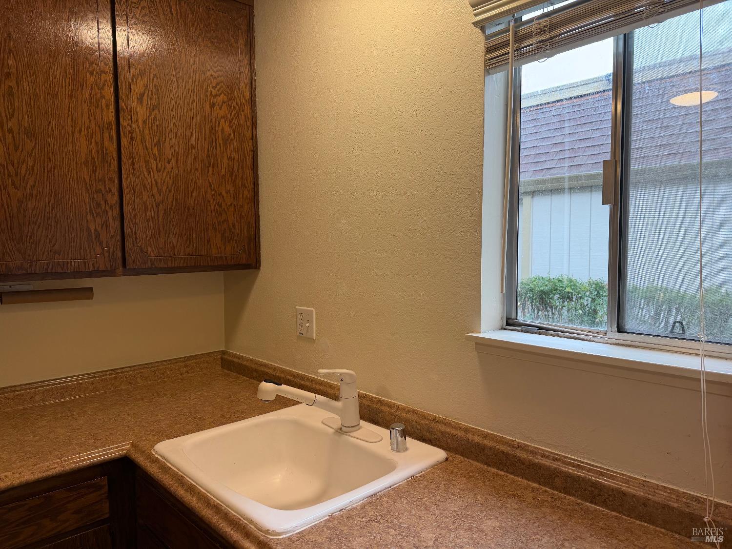 1964 Knolls Drive Santa Rosa, CA 95405 - Photo 13 of 39 a bathroom with a sink and a window