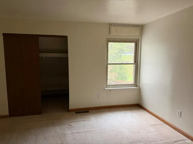 an empty room with a window