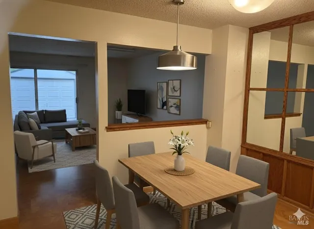 a view of a dining room with furniture