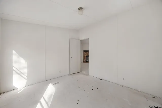 a view of a room that has a window in it