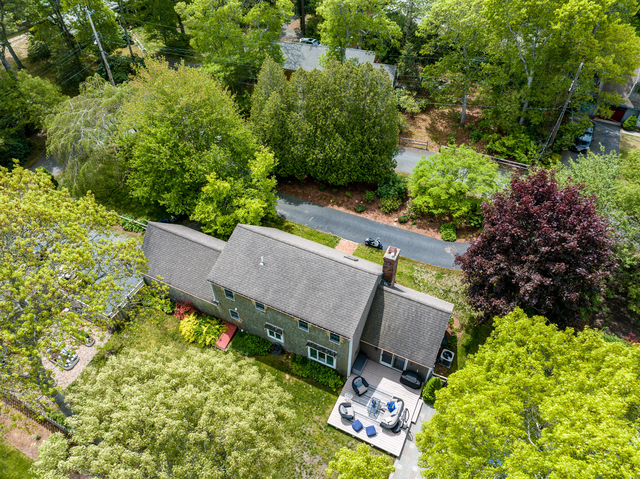 61 Angus Way Centerville, MA 02632 - Photo 59 of 59 an aerial view of a house with garden space and street view