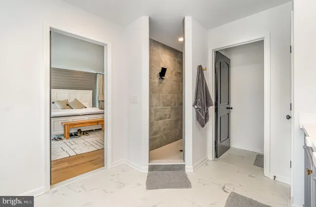 a view of a livingroom with furniture hardwood floor and staircase