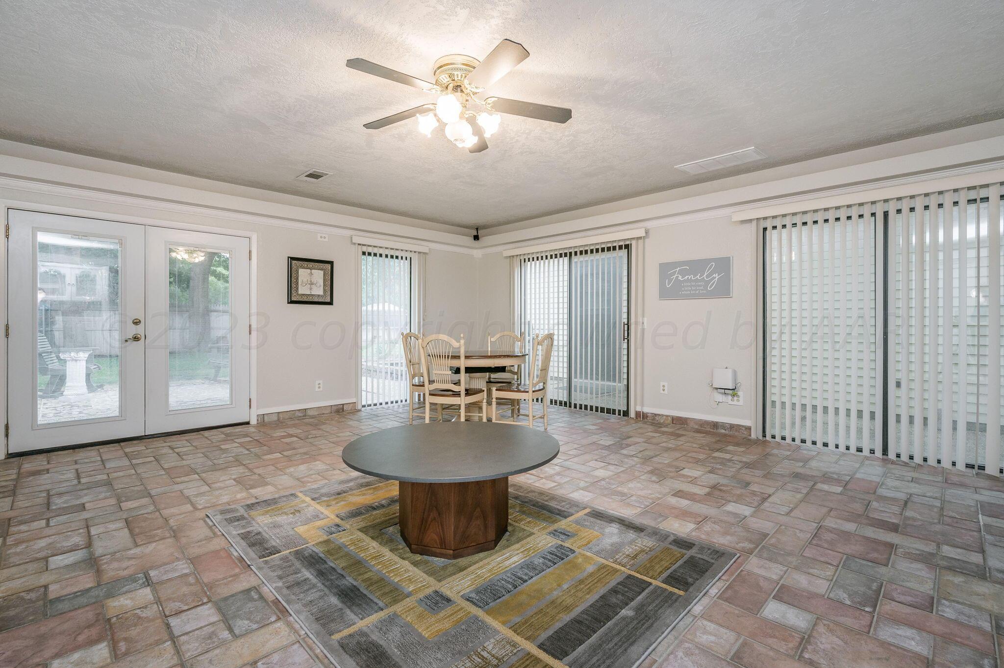 6019 Calumet Road Amarillo, TX 79106 - Photo 13 of 25 a view of a livingroom with furniture and window