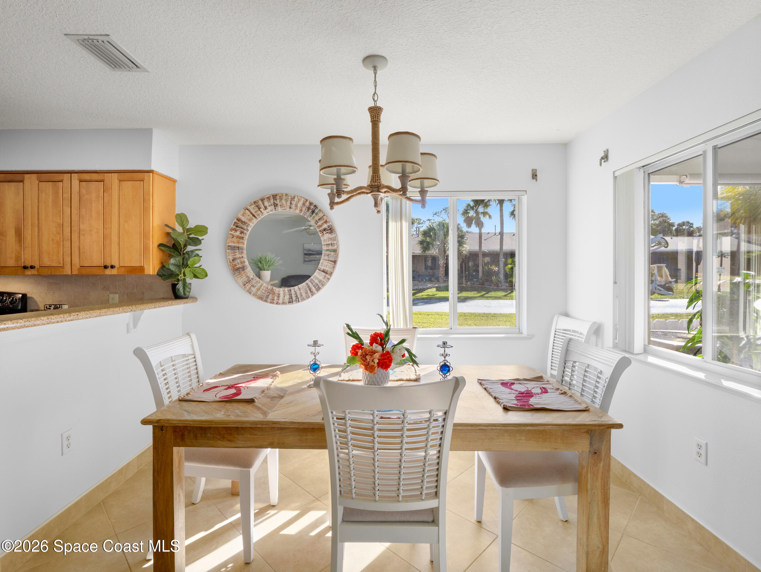 214 Channel Court, Unit 123 Rockledge, FL 32955 - Photo 7 of 33 Sunny Dining Area