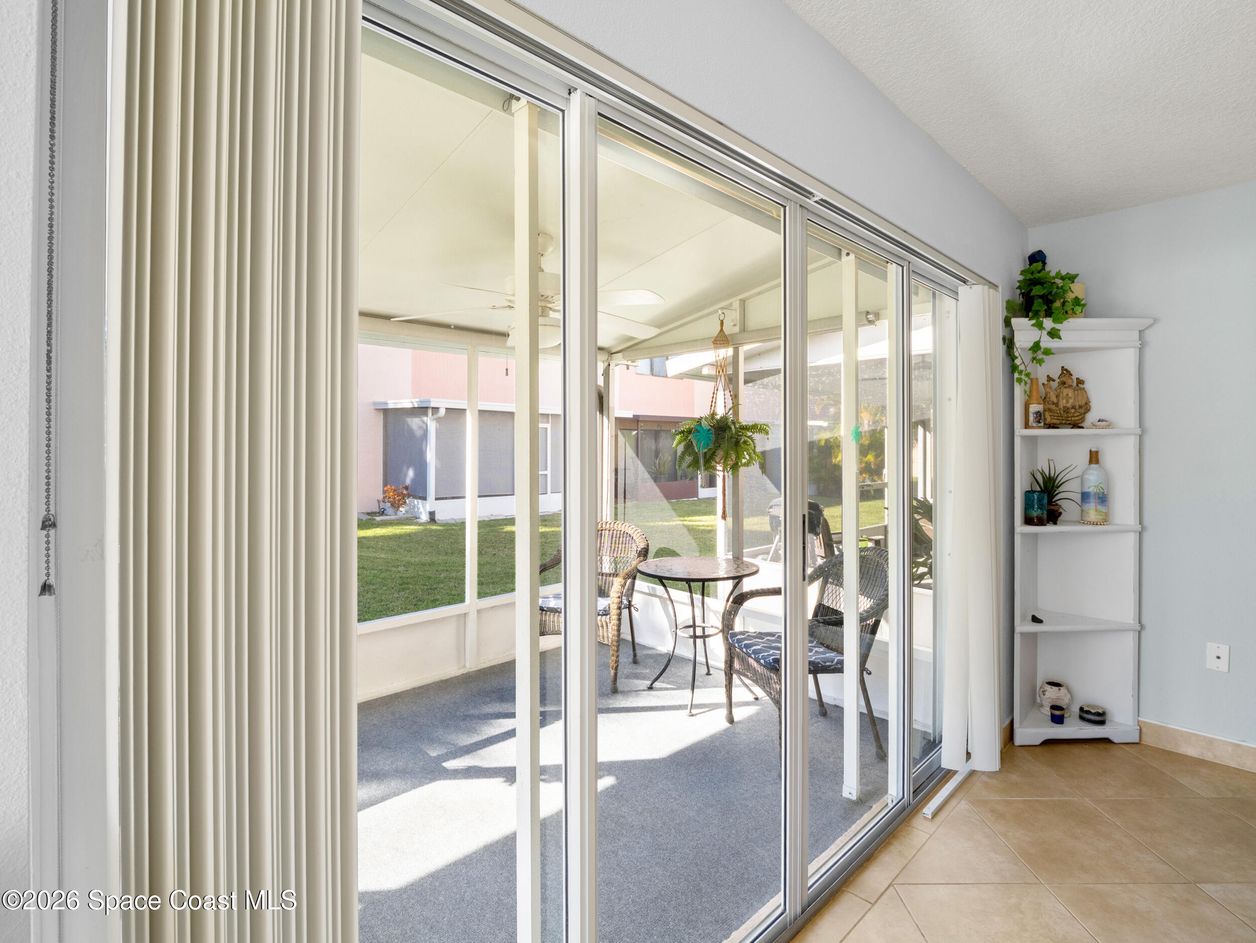 214 Channel Court, Unit 123 Rockledge, FL 32955 - Photo 8 of 33 Porch with Hurricane Shutters