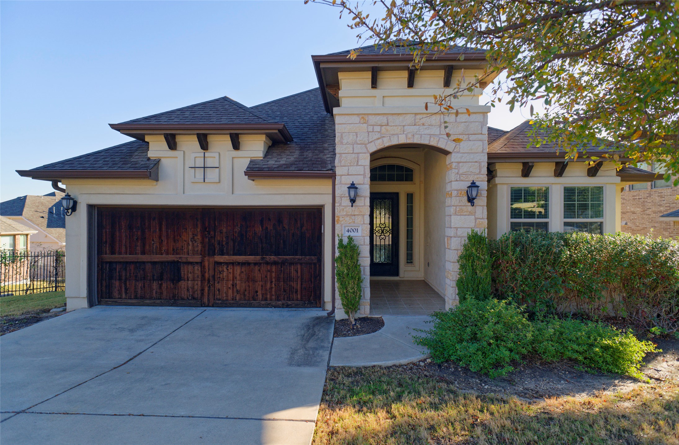 4001 Goodnight Trail Leander, TX 78641 - Photo 1 of 35 a front view of a house with a yard