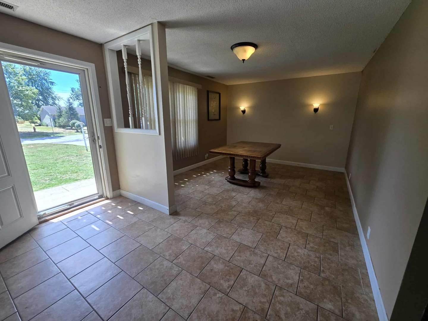 108 Mockingbird Lane Woodlawn, IL 62898 - Photo 14 of 43 a view of a livingroom with a flesh screen tv and window