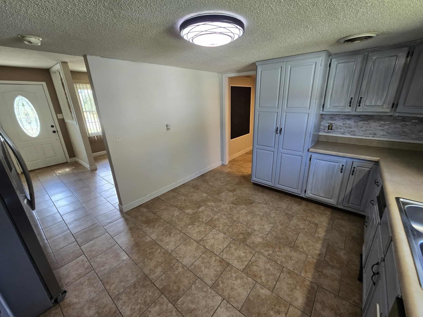 108 Mockingbird Lane Woodlawn, IL 62898 - Photo 23 of 43 a view of a kitchen with a sink
