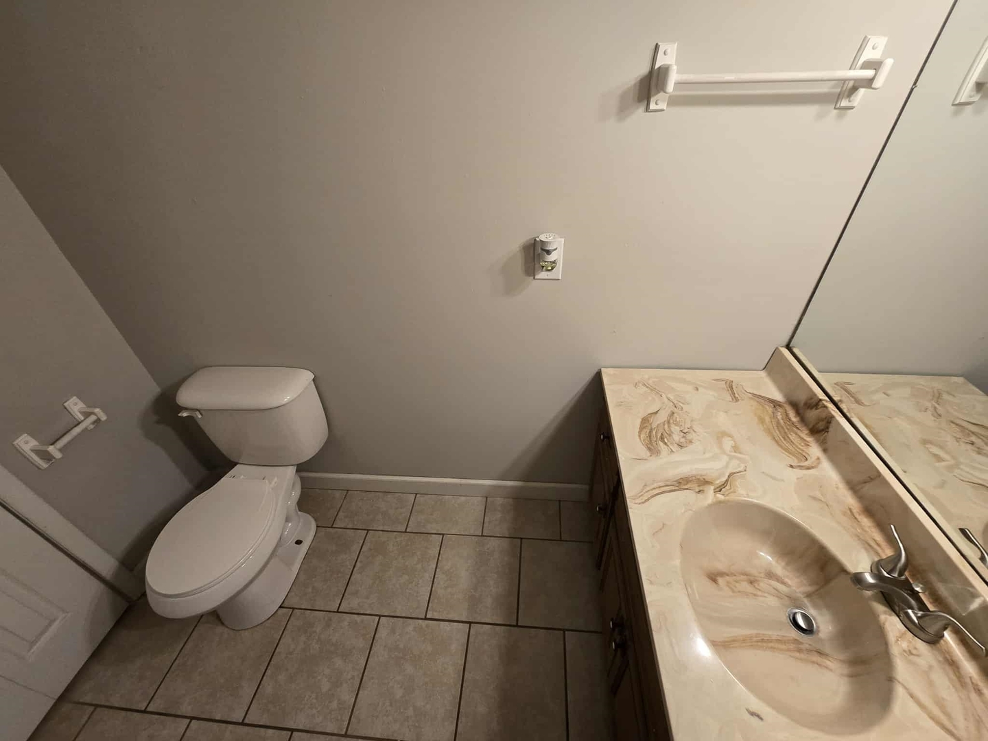 108 Mockingbird Lane Woodlawn, IL 62898 - Photo 24 of 43 a bathroom with a toilet and a mirror