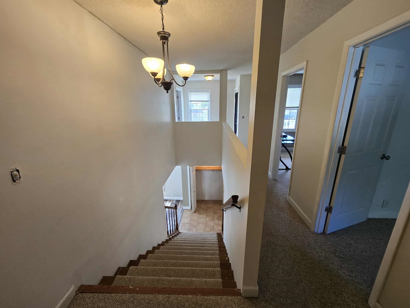 108 Mockingbird Lane Woodlawn, IL 62898 - Photo 29 of 43 a view of a hallway with wooden floor and staircase