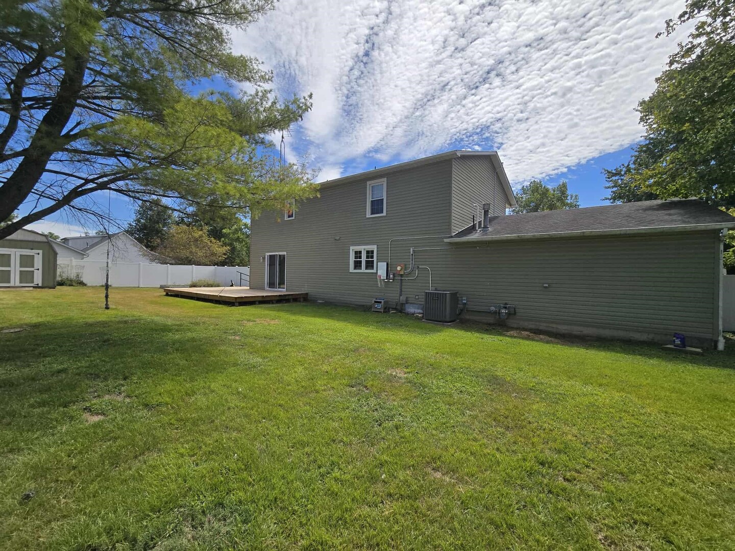 108 Mockingbird Lane Woodlawn, IL 62898 - Photo 7 of 43 a backyard of a house with lots of green space